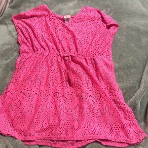 6 year old Beach dress. Very cute over a bikini or one piece and convenient.